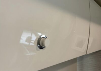 White knob on white cabenit
